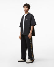 Load image into Gallery viewer, Reflective Print Logo Track Pants : Men Trousers Black | GCDS Spring/Summer 2023
